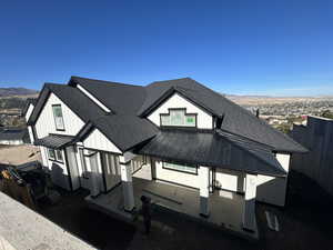 Back of house with a mountain view