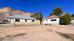 Back of house with a mountain view