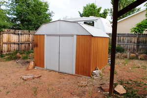 View of outdoor structure featuring central AC