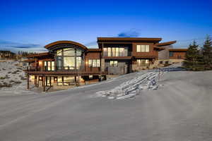 View of front of home featuring a balcony