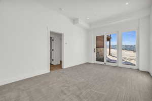 Carpeted spare room with a mountain view