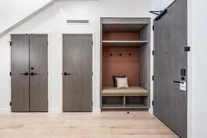 Mudroom featuring light hardwood / wood-style floors