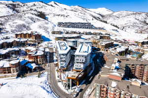 Snowy aerial view with a mountain view