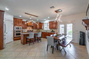 kitchen with travertine backsplash