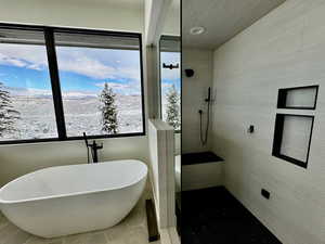 Primary Bathroom featuring tile patterned floors