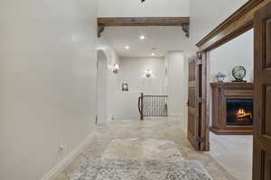 Hallway with tile floors