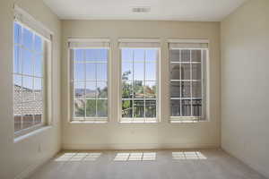 Primary Bedroom sitting area, large windows, views