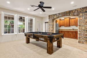 Game room with light carpet, recessed lighting, billiards table, ceiling fan, and arched walkways