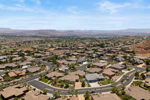 View of property location with a mountainous background and nearby suburban area