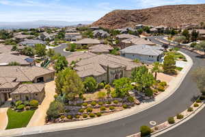 Aerial view of residential area featuring a mountain backdrop