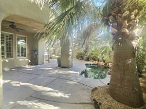 View of terrace featuring ceiling fan