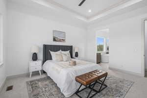 Bedroom with carpet and natural light