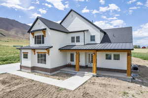 View of front of property featuring a mountain view