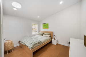 Bedroom featuring carpet and natural light