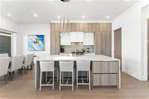 Kitchen featuring natural light, light countertops, and light flooring