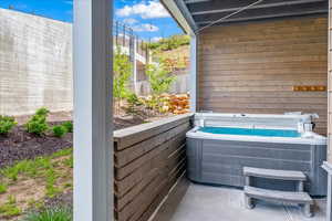 Balcony featuring a jacuzzi