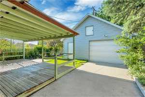 Oversized garage complete with one parking bay, large upper storage area and a great flex studio space