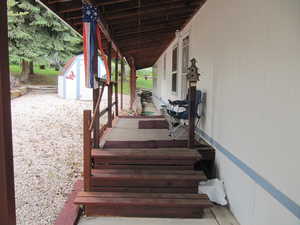 Stairway featuring a deck