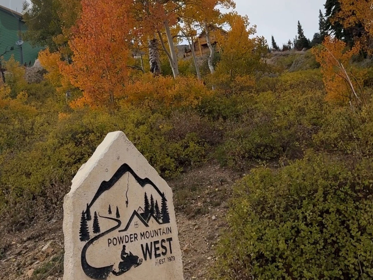 Sculpted stone marker indicating "Powder Mountain West at the gate.53 lots in this subdivision.