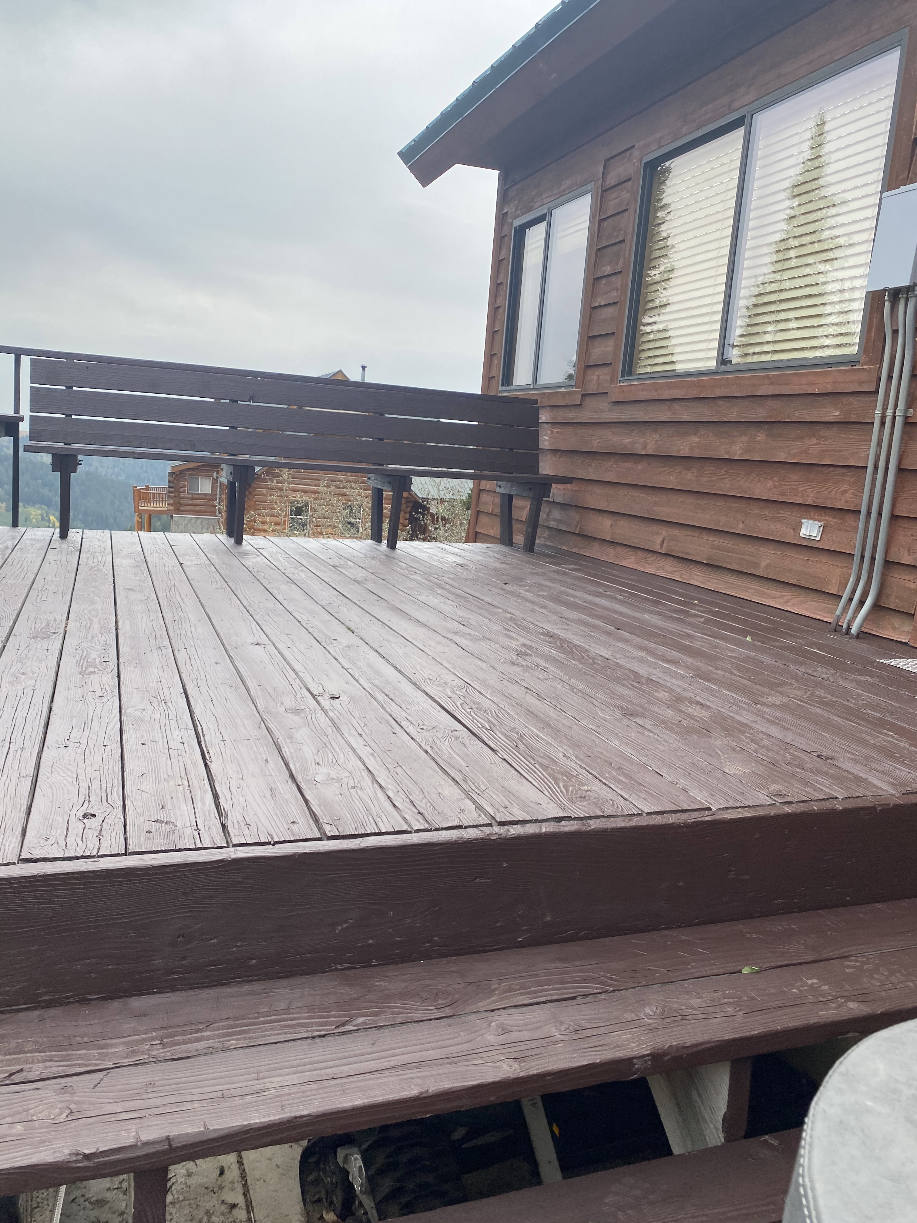 Large deck with carport below