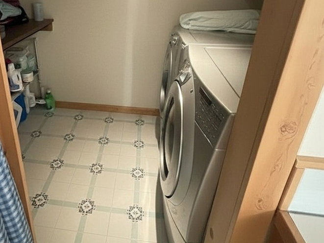 Dedicated laundry area featuring patterned tile flooring, recessed lighting, and integrated shelving