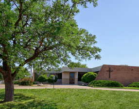 View of front of property with a front lawn