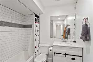 Full basement bathroom with a lot of storage.