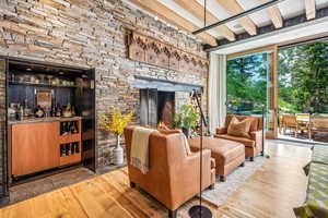 Living room featuring wood-type flooring and natural light