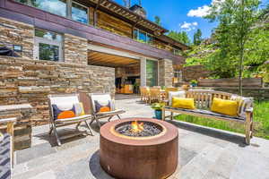 View of terrace featuring fire pit