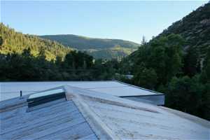 New Corten roof and flat TPO deck