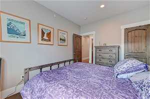 Bedroom with light hardwood floors