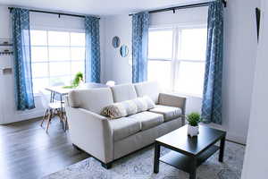 View of hardwood floored living room