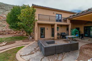 View of terrace featuring an outdoor living space and balcony