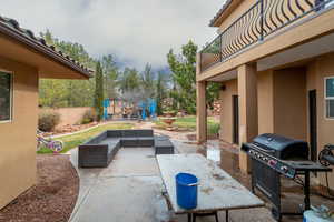 View of patio / terrace with an outdoor living space and balcony