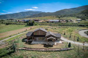 Bird's eye view featuring a rural view and a mountain view