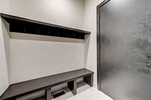 Mudroom with light tile floors