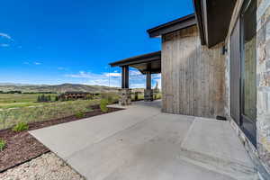 View of patio featuring a mountain view