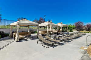 View of patio / terrace featuring a gazebo and an outdoor hangout area