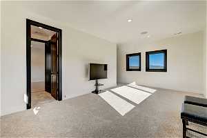 Unfurnished living room with light tile flooring