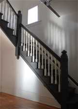 Original Victorian staircase with original newels, handrails, and balusters.