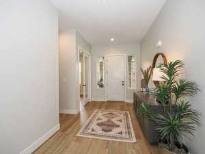 Entrance foyer featuring light hardwood flooring