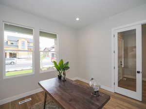 View of hardwood floored office space