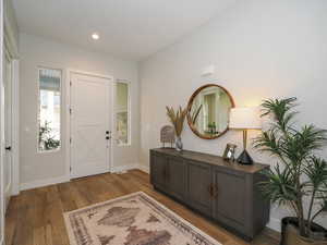 Entryway with light hardwood floors