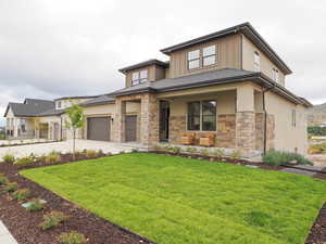 Prairie-style house with a front yard