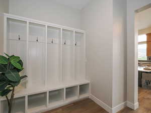 Mudroom featuring hardwood flooring