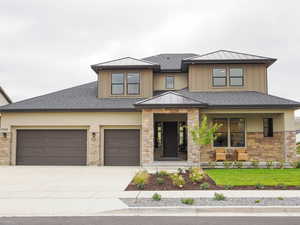 View of front of home featuring a front lawn