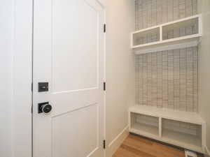 Mudroom featuring light wood-type flooring