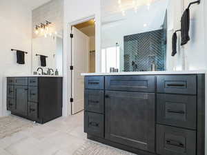 Bathroom featuring tile floors and oversized vanity