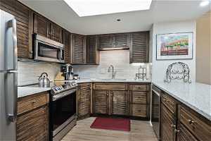 Kitchen with new Granite, Sink, Backsplash & Appliances