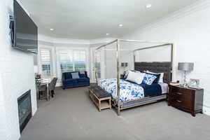 Large main floor master suite connects to the wrap around deck and has a zenful master bathroom.